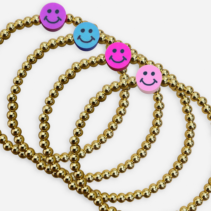 beaded bracelets with smiley face charm in purple, blue, hot pink, or light pink